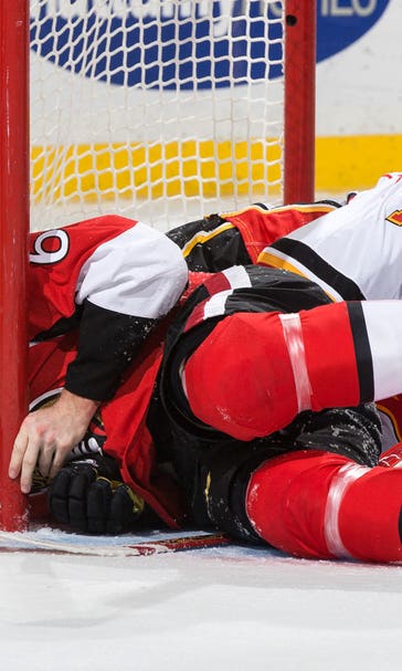 Flames' Hiller out at least one week after collision with Senators' Ryan